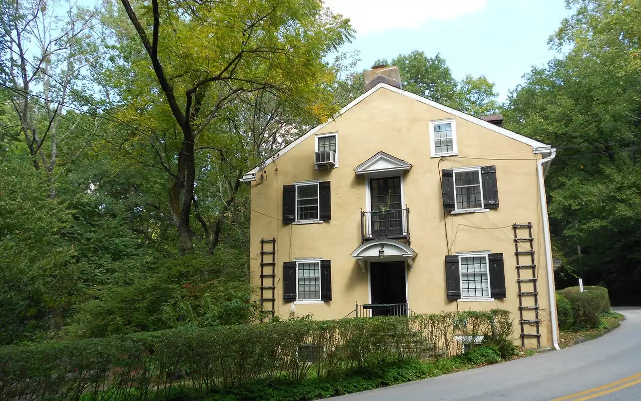 A historic house on a wooded lane in the Mill Creek district