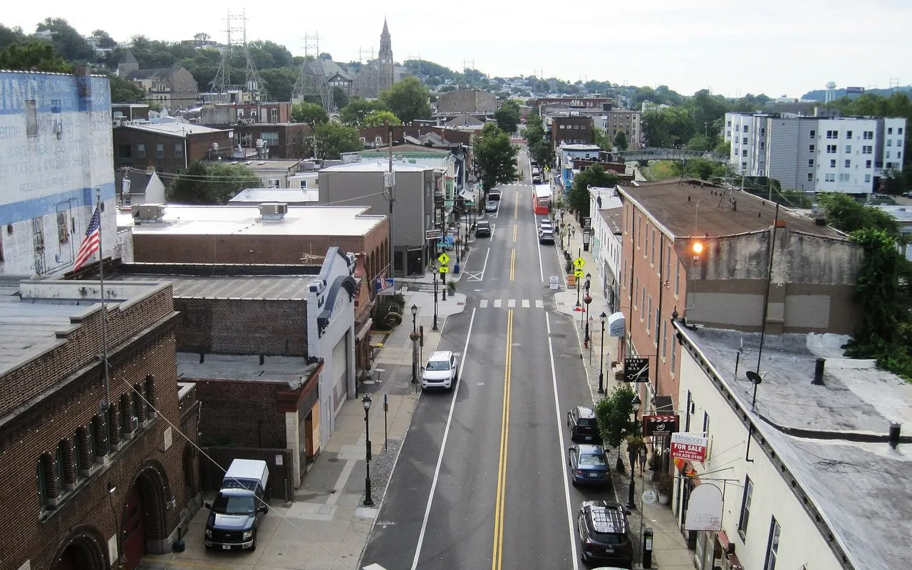 Main Street in Manayunk from the Manayunk Bridge, with rowhouses on the hill behind